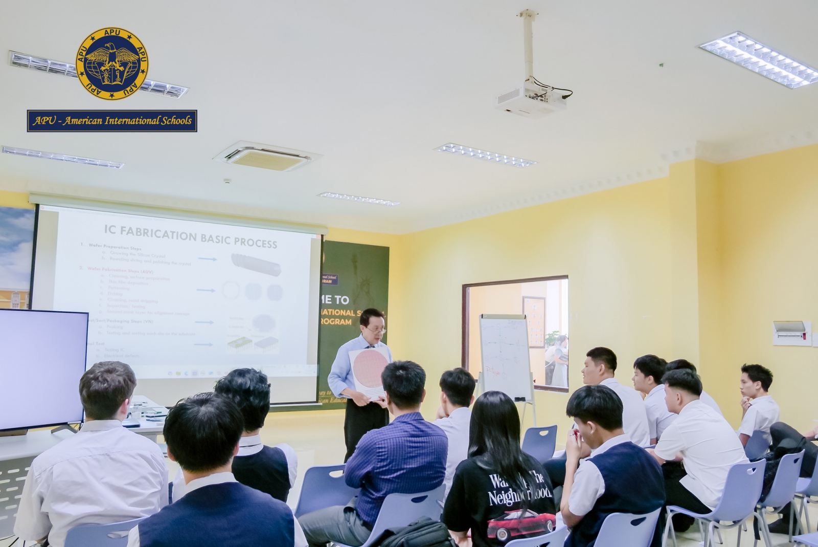 May be an image of 9 people, people studying and text